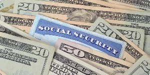 Image depicting a disabled veteran reviewing information on Social Security Disability Insurance (SSDI) benefits.