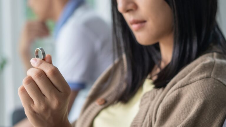 wife looking at wedding ring