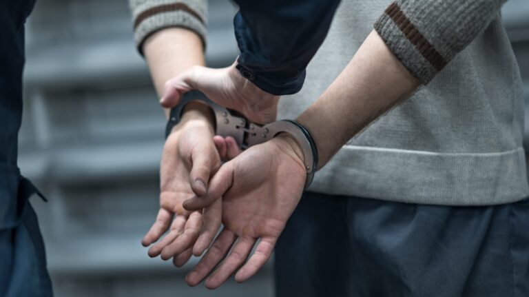 handcuffs on the man