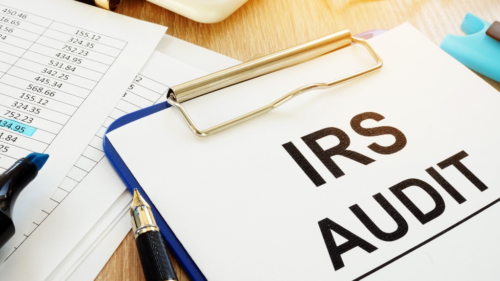 IRS audit documents with clipboard